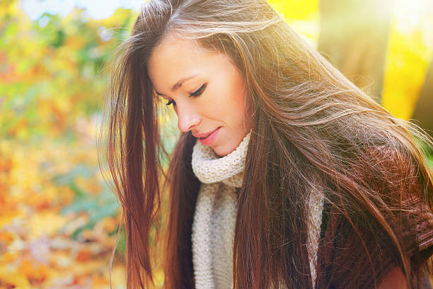 istock Woman in Autumn scenery 472093219