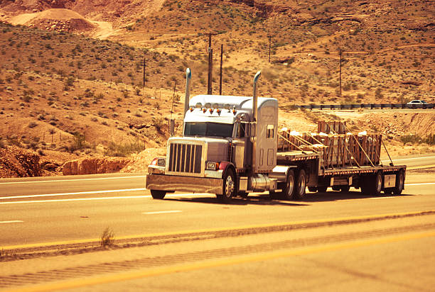 istock American truck running on the asphalt 472094037