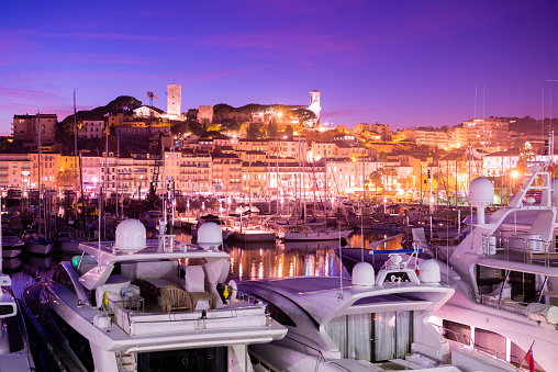 Le Vieux Port. Cannes old port marina at night with luxury yachts. South of France. Cote d'Azur.