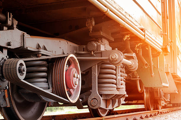 istock Vintage steam train wheels close-up. 472094348