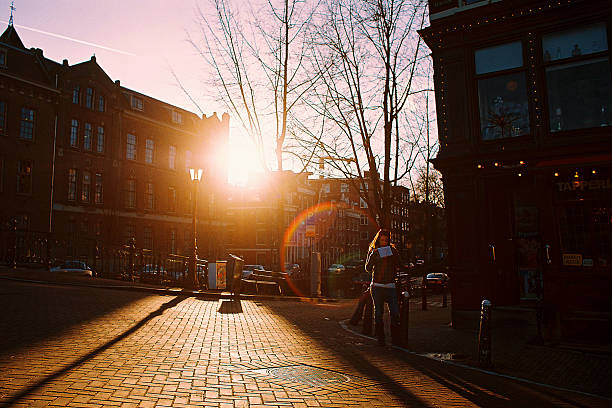 istock Amsterdam sunshine street 472094823
