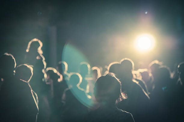 istock crowd at a concert in a moody light noise added 472094868