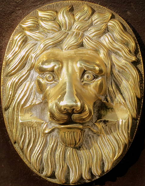 istock Door ornament  with a gold lion head 472095179