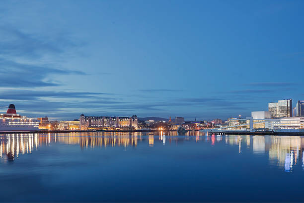 istock Skyline of Oslo at night reflecting in water. 472095455