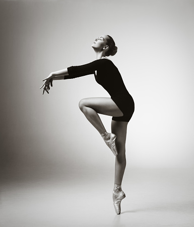 Young ballerina with a beautiful tutu, posing.