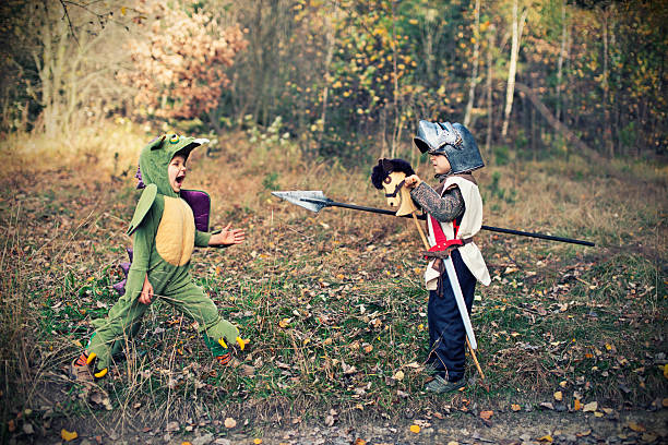 istock Knight fighting with green dragon. 472098333