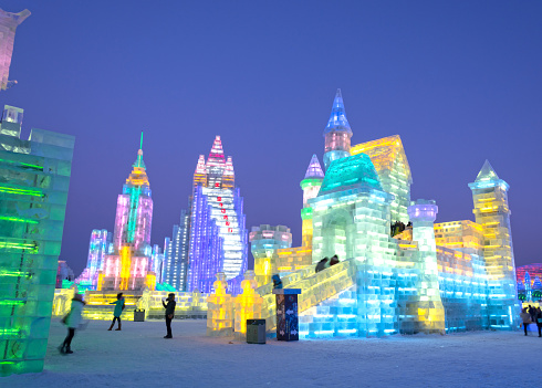 Harbin, China - December 30, 2013: Harbin Ice and Snow World. People are walking. Located in Harbin City, Heilongjiang Province, China.