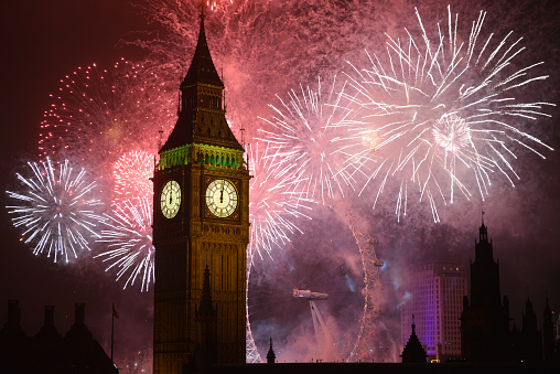 Spectacular Fireworks surround Big Ben at midnight on New Years Eve