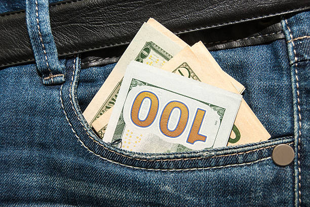 istock 100 dollars banknote in the back jeans pocket 472100400