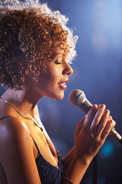 istock Female Jazz Singer On Stage 472101231