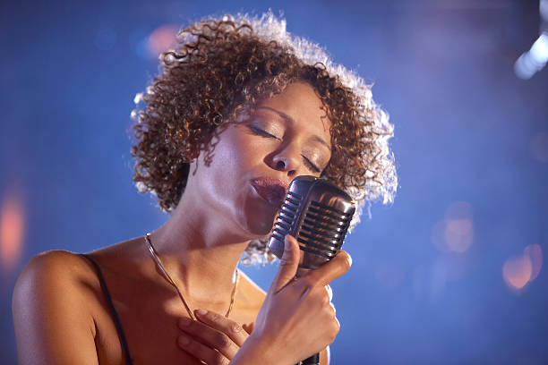 istock Female Jazz Singer On Stage 472101239