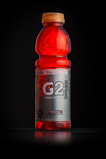 Chatham, NJ, USA - January 1, 2014: Photo of a red Gatorade G2 bottle. Gatorade is a sports drink brand manufactured by PepsiCo. G2 is the low-calorie version of original Gatorade.
