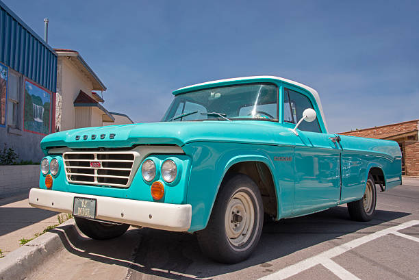 Williams, USA - June 3, 2013: Restored blue vintage D100 Dodge pickup truck from the 60's, parked in the village of Williams along route 66.