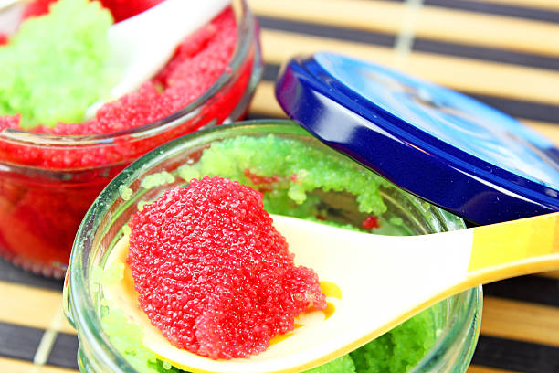 istock red and green caviar in glass jars 472103081