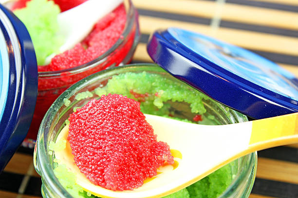 istock red and green caviar in glass jars 472103085