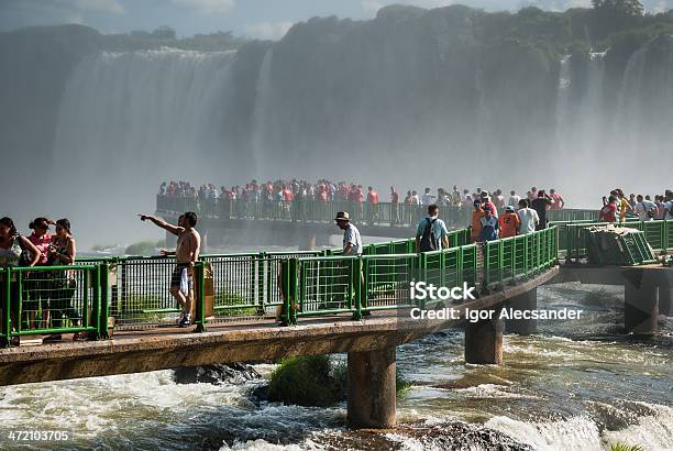 Tourists At Iguazu Falls In Brazil Stock Photo - Download Image Now - Iguacu River, Walking, Hiking
