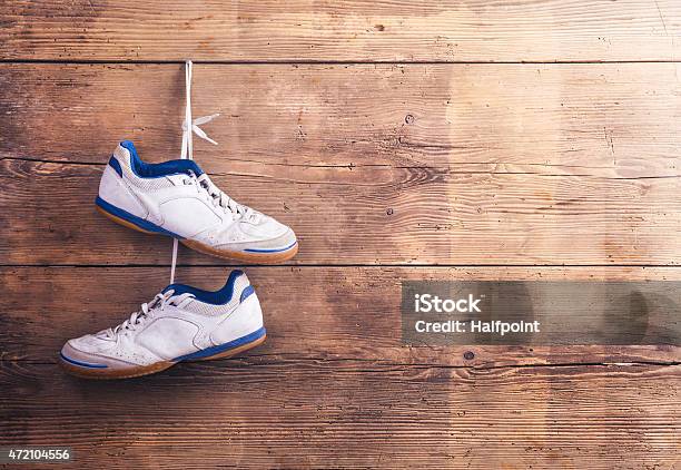 Sports Shoes On The Floor Stock Photo - Download Image Now - 2015, Boot, Clothing