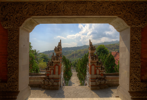 Buleleng, Indonesia - August 20, 2011: Buddhist temple on Bali: View through two gates.