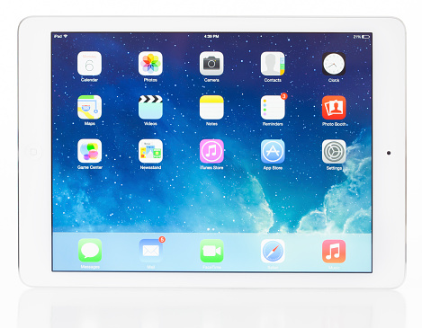 Las Vegas, USA - January 06, 2014: A photo of a white Apple iPad Air isolated on a white background. The iPad Air is the fifth generation iPad tablet computer designed and developed by Apple Inc.