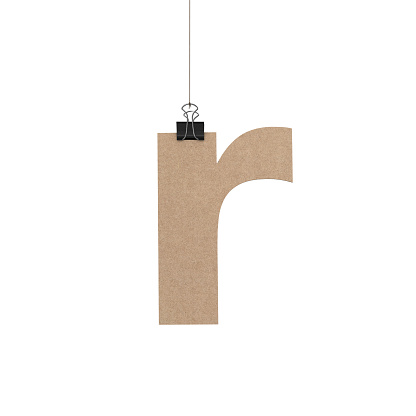 A  3D representation of Lowercase letter r hanging on a plain white background. The letter is hanging from a binder paper clip that is attached to a piece of string. The letter has a cardboard texture. The background is pure white. All letters are available and can be combined to form words.