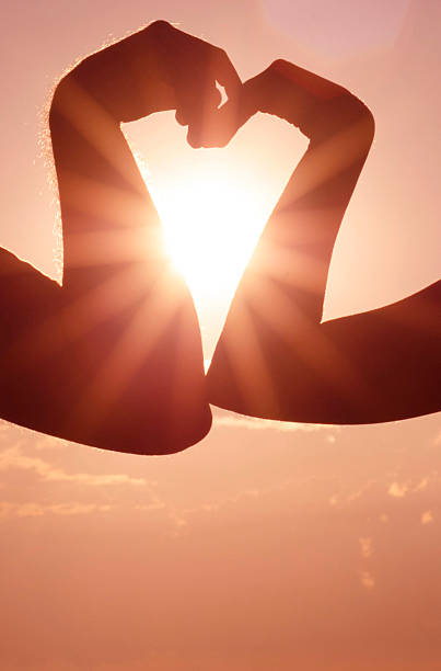 istock heart made of arms 472108563