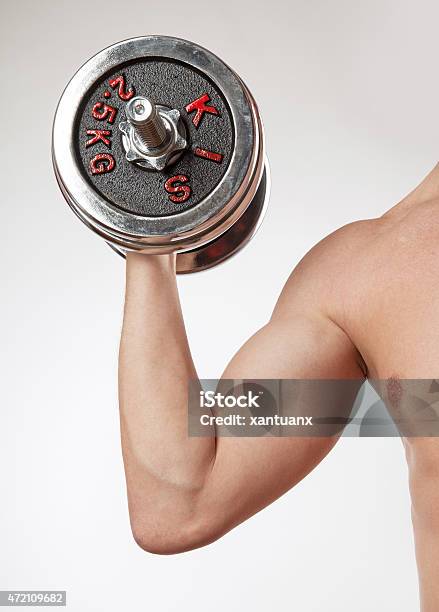 Hand Holding Chrome Dumbbell On The White Background Stock Photo - Download Image Now