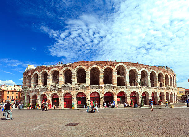 арена di verona, italy - ancient column past arch стоковые фото и изображения