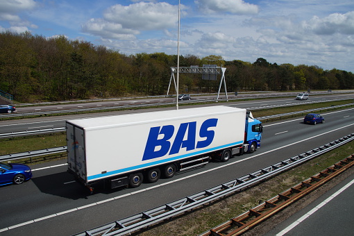 Laren, Noord-Holland, The Netherlands - May 1, 2015: BAS Logistics Transport delivery truck van on Dutch highway A1
