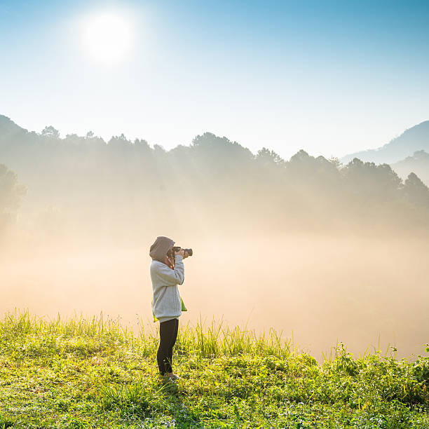 istock Beautiful sunshine at misty morning mountains . 472111233