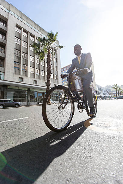 istock African businessman on his bicycle commuting Cape Town. 472112037