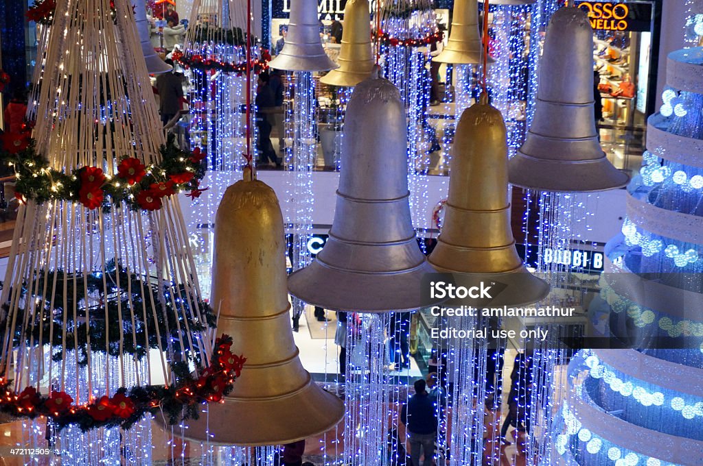 Christmas decorations - bells, flowers and tree Gurgaon, India - 29th Dec 2013: Shopping malls in Gurgaon and Delhi sport beautiful decorations that vary according the festival. This has made them the hangout location of choice for the people of delhi, especially the youngsters. Asia Stock Photo