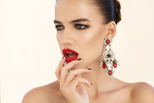 istock Nice looking woman with beautiful earings 472113057
