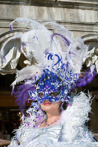 Beautiful Peacock Carnival Costume Performing on Venice Streets During Venice Carnival