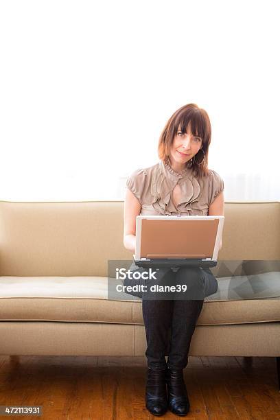 Woman On A Laptop Stock Photo - Download Image Now - Adult, Beige, Hot Desking