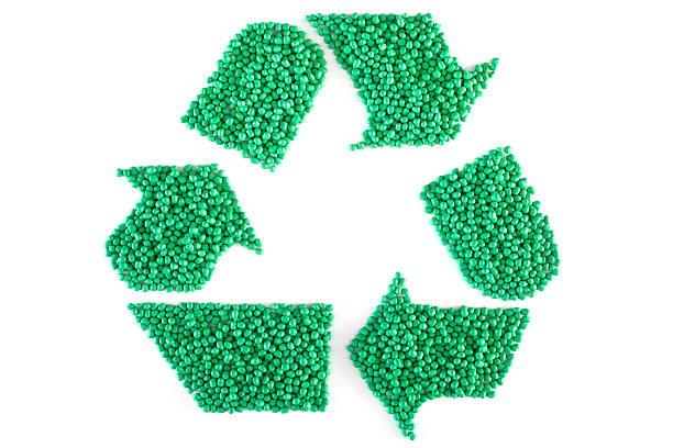 Recycle symbol made up of green plastic resin pellets Green Plastic Resin Pellets,Recycle, Clipping Path,Masterbatch, Polymer,Isolated on White polypropylene stock pictures, royalty-free photos & images