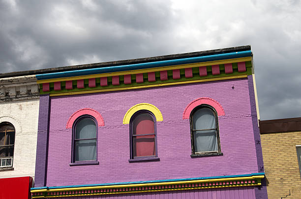 istock Bright Purple Painted Brick Apartment Windows 472114568