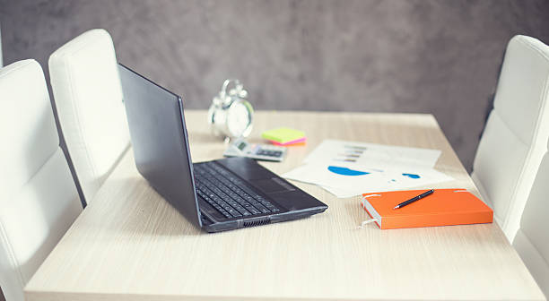 istock Meeting room with laptop on table 472114590