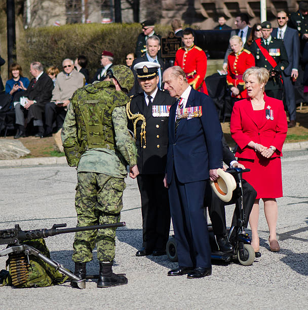 Toronto Bicentennial Commemoration Battle of York Toronto, Canada- April 27,2013:  Prince Philip, the Duke of Edinburgh  visits Canada to present the new Colours to the 3rd Battalion of the Royal Canadian Regiment. The ceremony takes place in front of the Queen's Park Legislative Assembly of Ontario. His Royal Highness is the Colonel-in-Chief of the Royal Canadian Regiment since December 1953 prince phillip stock pictures, royalty-free photos & images