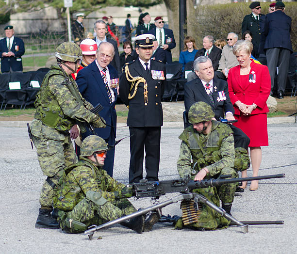 Toronto Bicentennial Commemoration Battle of York Toronto, Canada- April 27,2013:  Prince Philip, the Duke of Edinburgh  visits Canada to present the new Colours to the 3rd Battalion of the Royal Canadian Regiment. The ceremony takes place in front of the Queen's Park Legislative Assembly of Ontario. His Royal Highness is the Colonel-in-Chief of the Royal Canadian Regiment since December 1953 prince phillip stock pictures, royalty-free photos & images