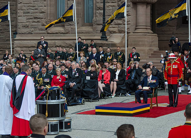 Prince Philip Duke of Edinburgh Toronto Battle York Toronto, Canada- April 27,2013:  Prince Philip, the Duke of Edinburgh  visits Canada to present the new Colours to the 3rd Battalion of the Royal Canadian Regiment. The ceremony takes place in front of the Queen's Park Legislative Assembly of Ontario. His Royal Highness is the Colonel-in-Chief of the Royal Canadian Regiment since December 1953 prince phillip stock pictures, royalty-free photos & images