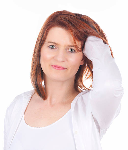 istock Happy middle aged woman looking at camera 472116250