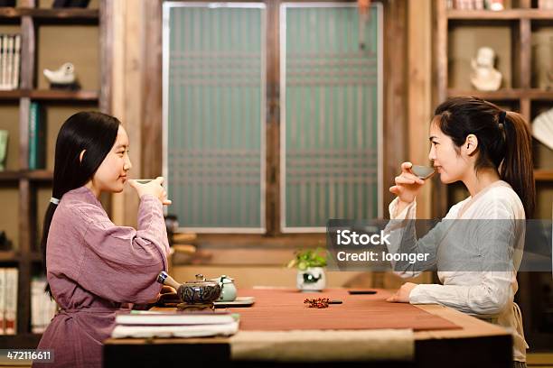 Two East Asian Girl Showing Tea Ceremony Stock Photo - Download Image Now - 16-17 Years, 20-29 Years, Adult