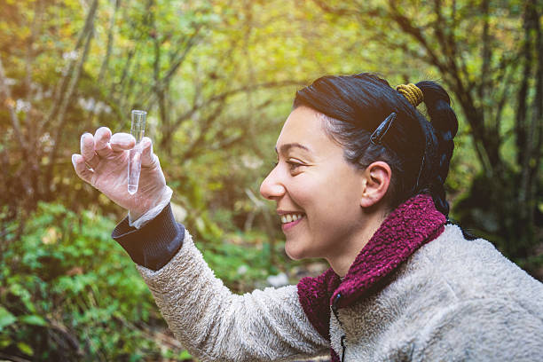istock Young ecologist woman in the forest 472117355