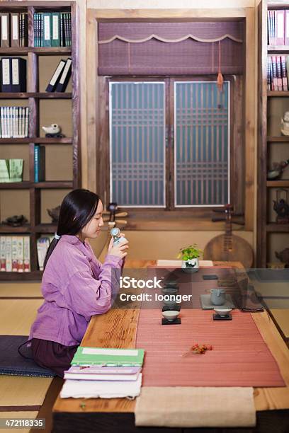 East Asian Teenage Girl Showing Tea Ceremony Stock Photo - Download Image Now - 16-17 Years, Adult, Asian and Indian Ethnicities