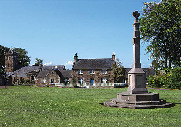 The Village Green Direlton, East Lothian North Berwick, Scotland - May 3, 2002: the picturesque village of Dirleton with its Mediaeval Castle, 17th Century Church and village green attracts visitors all year round. north berwick scotland east lothian castle scotland stock pictures, royalty-free photos & images