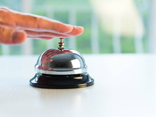 istock Person ringing bell for service 472118697