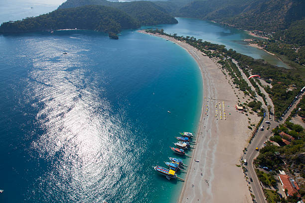 istock beach boats and sea from the sky 472118853