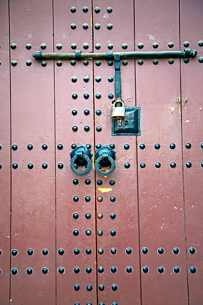 istock rusty  brown    morocco in africa   and safe padlock 472118920
