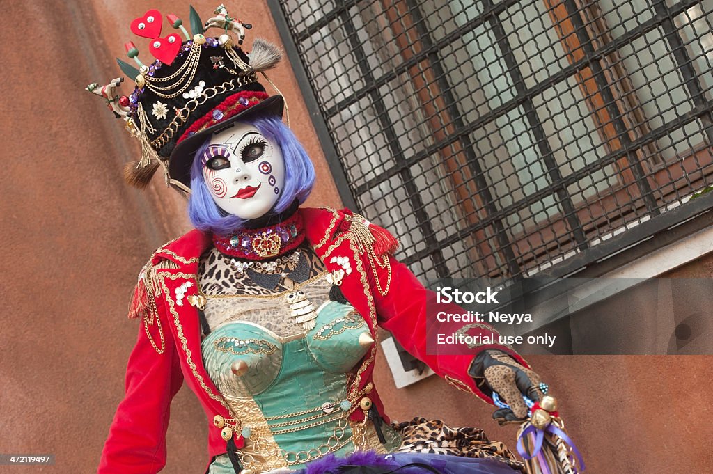 Venice Carnival 2013 Venice, Italy - February 4, 2013: The photo was taken during the famous Venice carnival on Campo San Zaccaria. We can see portrait of attractive masked person with amazing carnival costume. Venice, Italy, Europe.  2013 Stock Photo