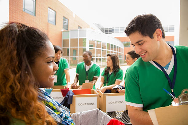 istock Volunteers: College students collect clothing donations. 472119503